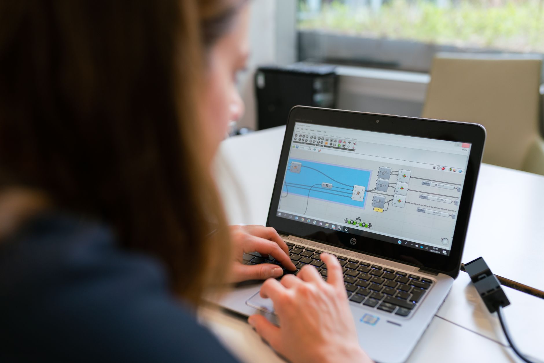 Project manager using BoKapsys software for utilization monitoring.