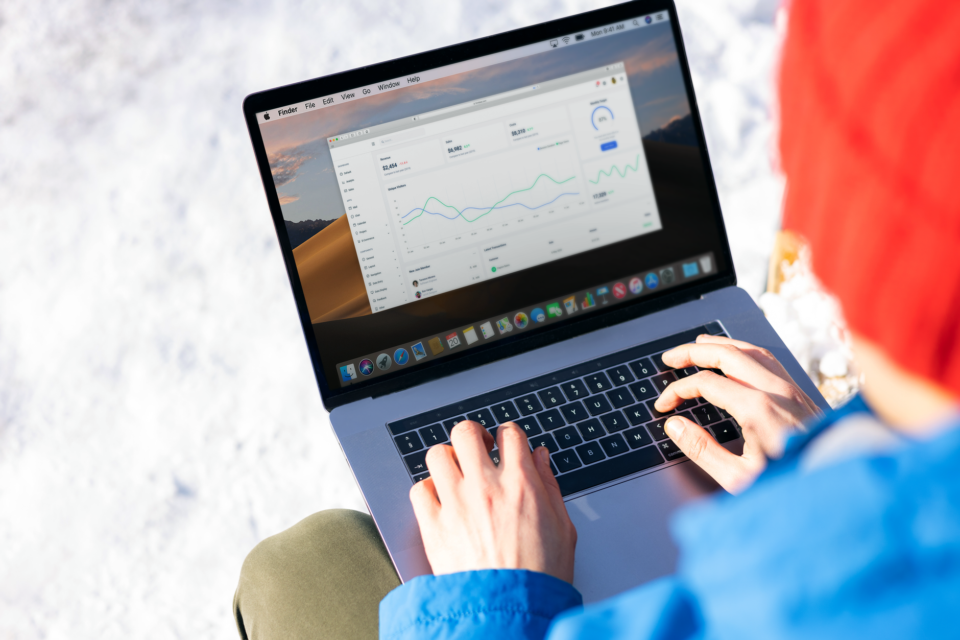Business owner using a financial dashboard for insights.